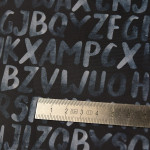 Tissu imperméable - déperlant type Kway - lettres - "KARMA" - Noir et gris - Les Filles à Pois ® - Oeko-Tex ® Les Filles à Pois 