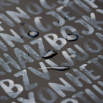 Tissu imperméable - déperlant type Kway - lettres - "KARMA" - Noir et gris - Les Filles à Pois ® - Oeko-Tex ® Les Filles à Pois 