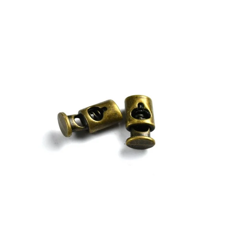 Arrêt cordon métal ovale – 4 mm – Simple trou – Lot de 2 – Argenté, gun, bronze ou doré Tissus et mercerie créative – Nos sélect