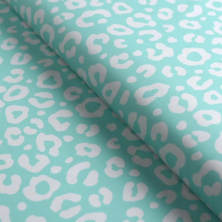 Tissu lycra maillot de bain fleurs "Lagoon Rush" vert et écru - UFP50+ - Collections Contrastes - Les Filles à Pois Design Les F