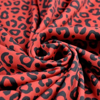Tissu jersey côtelé "Tigriska" rouge et noir – Collection Contrastes - Les Filles à Pois Design Les Filles à Pois - Design : mot