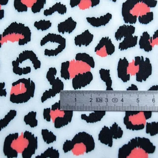 Lycra maillot de bain léopard corail et noir sur blanc UPF50+ "Velvet Wild" collection Klass – Les Filles à Pois Design Les Fill