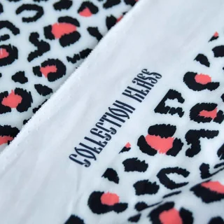 Lycra maillot de bain léopard corail et noir sur blanc UPF50+ "Velvet Wild" collection Klass – Les Filles à Pois Design Les Fill